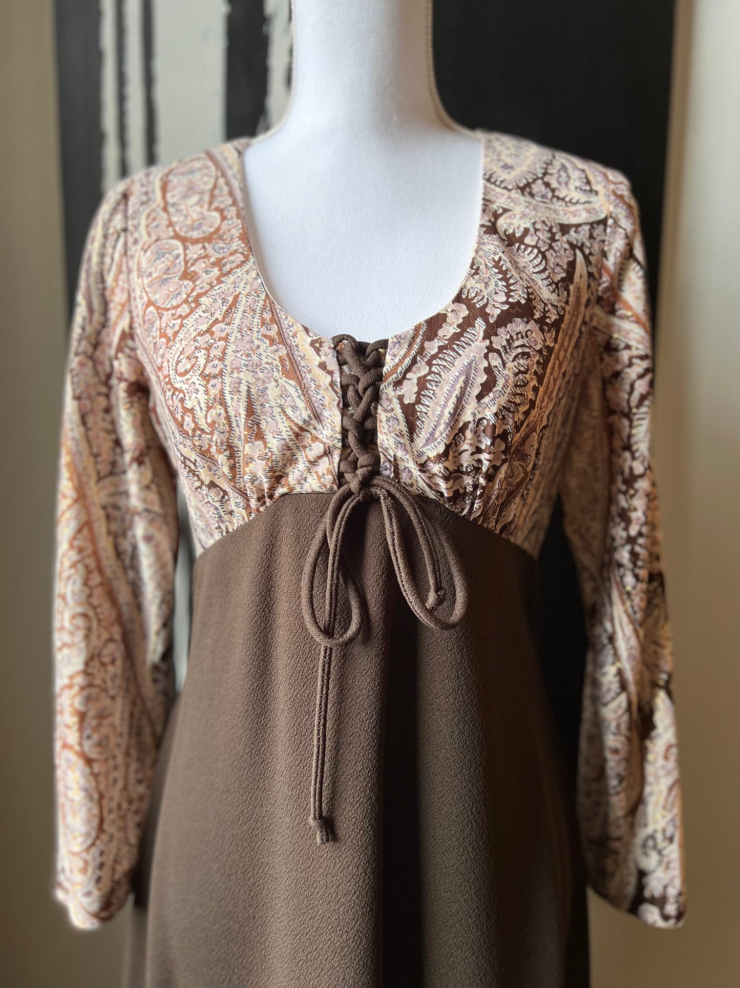 Brown paisley long dress with metallic gold thread and lace up top.